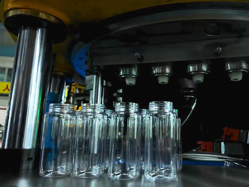 Three-station one-step injection stretch blow molding process